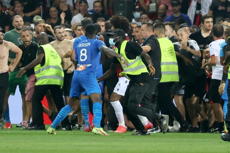 Nice, Marseille game halted by bottles, pitch invasion and brawl