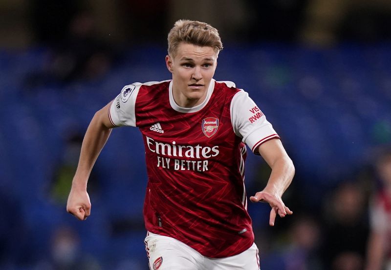Soccer-Arsenal say Odegaard clear for League Cup, Lacazette training again after COVID