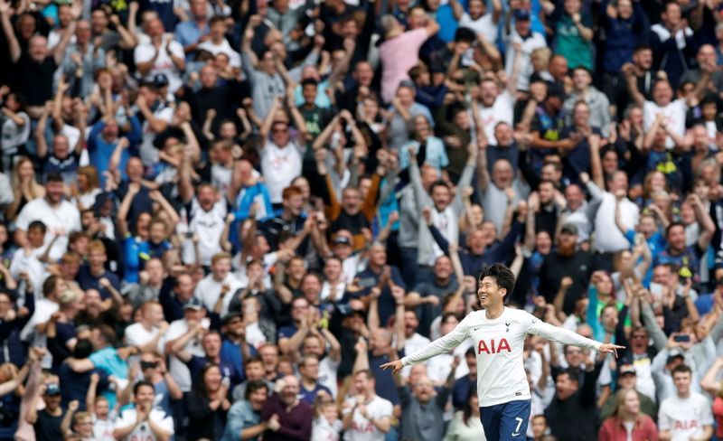 Soccer-Spurs go top of Premier League after Son sinks Watford