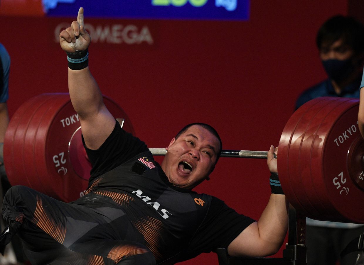 Powerlifter Yee Khie powers his way to silver in Tokyo Paralympics