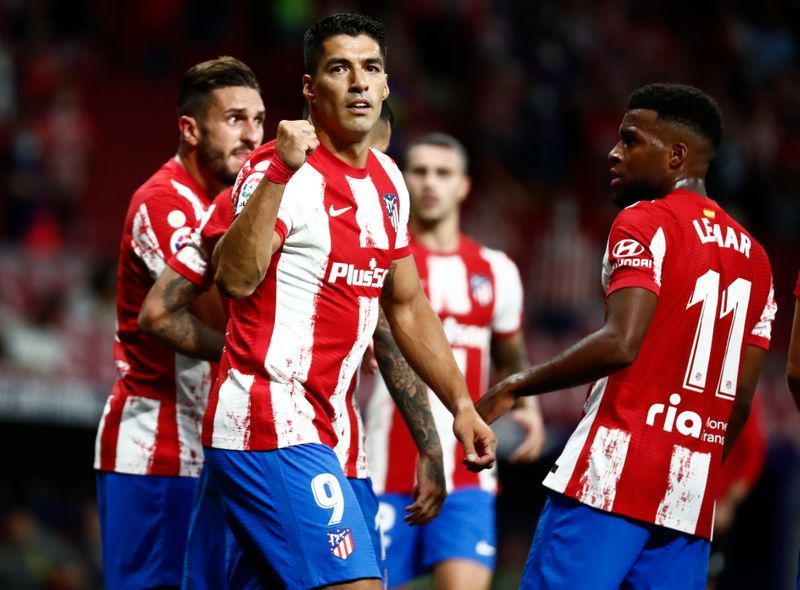 Soccer-Atletico avoid defeat by Villarreal with last-gasp own goal
