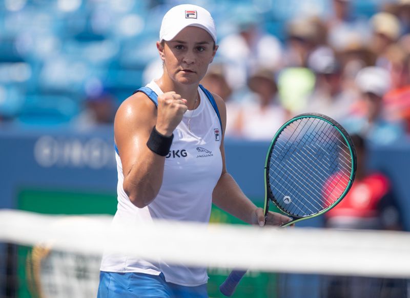 Tennis-Barty made to work for win over Zvonareva in first round