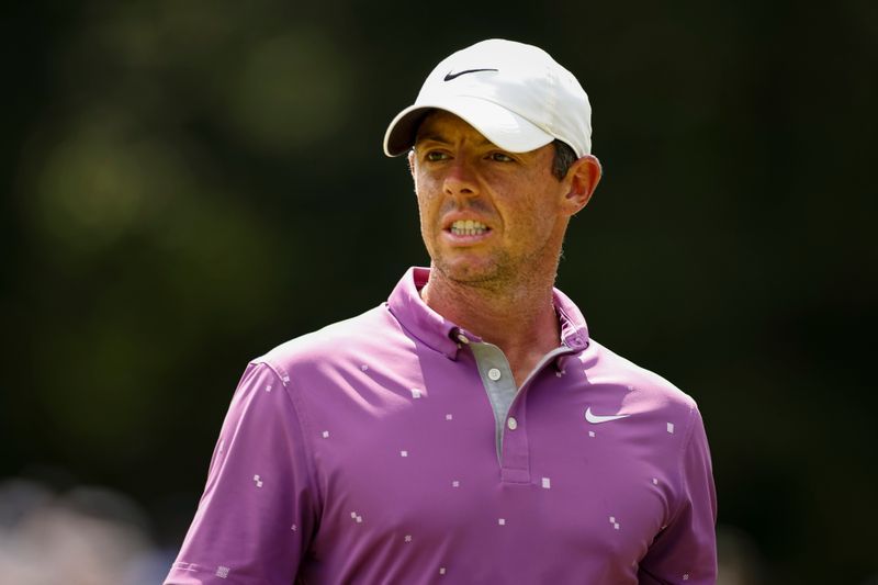Golf-McIlroy wants unruly fans held to higher standard