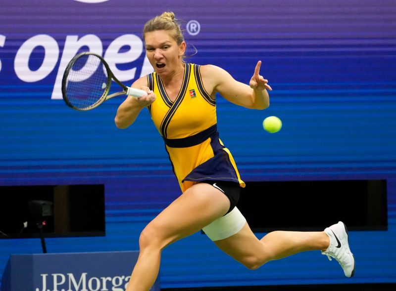 Tennis - Luck shines on Halep on rainy day at U.S. Open