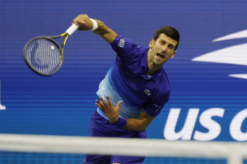 Sharper, more focused Djokovic advances to US Open third round