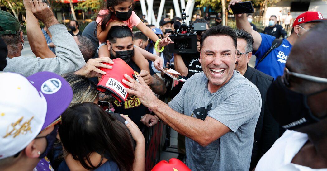 Oscar De La Hoya drops out of comeback fight after being hospitalized with Covid-19.