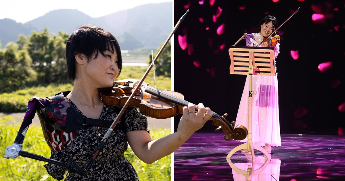 Ex-Paralympian uses prosthetic arm to play violin – and performs at the opening ceremony