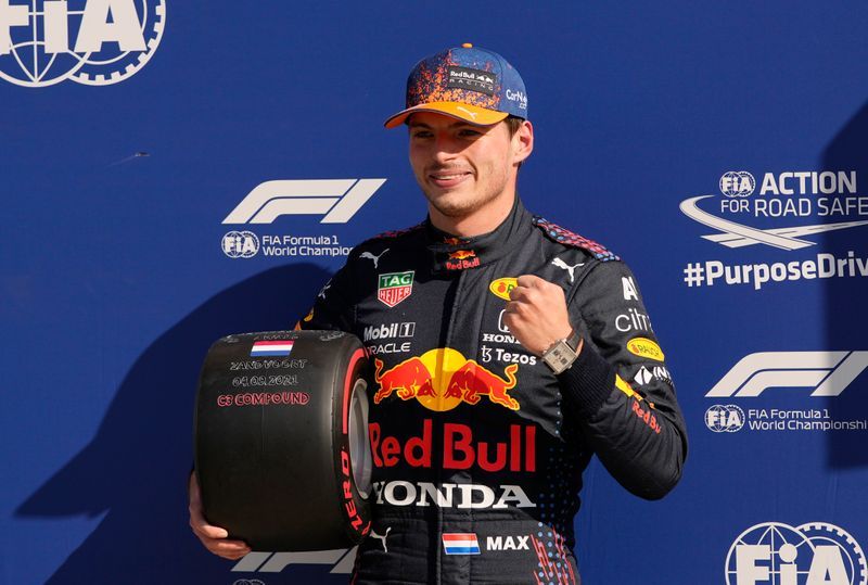 Motor racing-Verstappen takes Dutch GP pole with Hamilton alongside