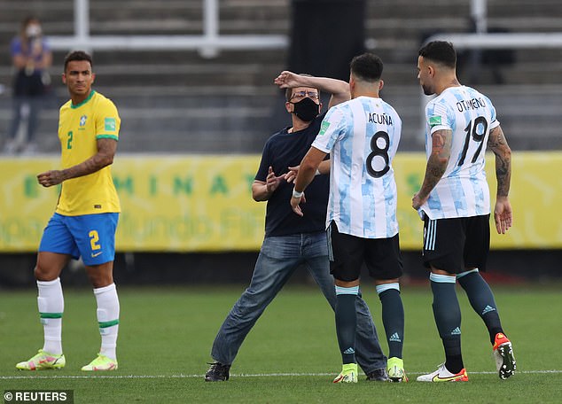 World Cup qualifier in Brazil is abandoned after public health officials storm pitch to DETAIN four Argentina players - who all play in the Premier League - for 'dodging quarantine' by failing to say they flew in from Britain