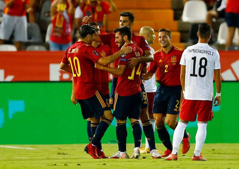 Soccer-Spain back on track with Georgia thrashing