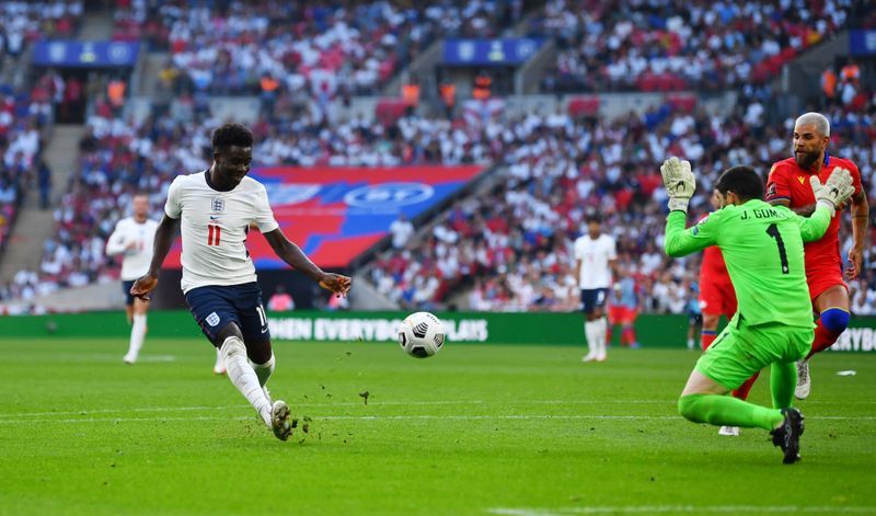 Soccer-Saka enjoys joyous Wembley return after penalty heartache