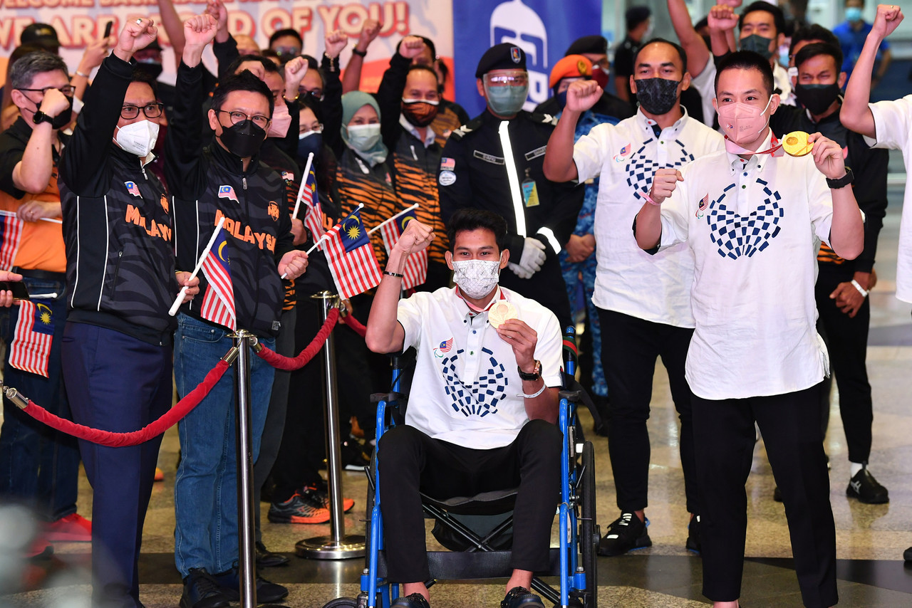 Paralympic athletes receive warm welcome home