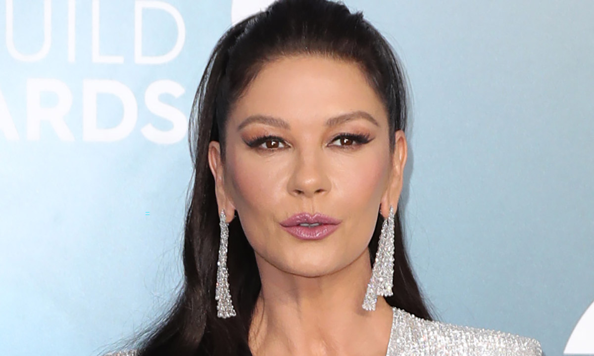 Catherine Zeta-Jones shows off endless legs in mini shorts as she returns to New York