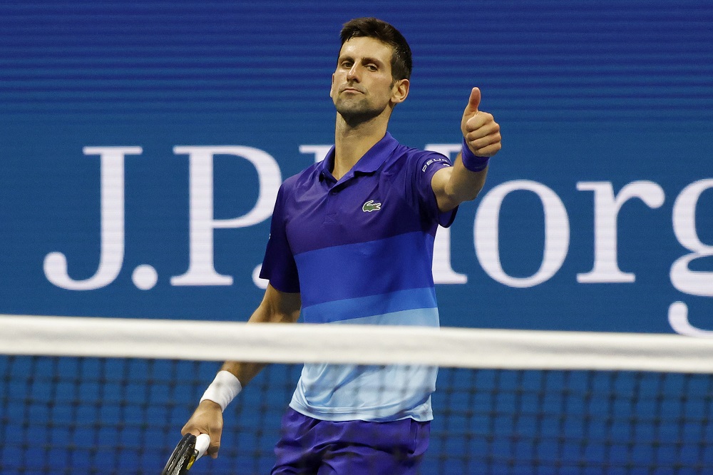Djokovic aims to tame 'hammer' Berrettini, nail down semi-final spot