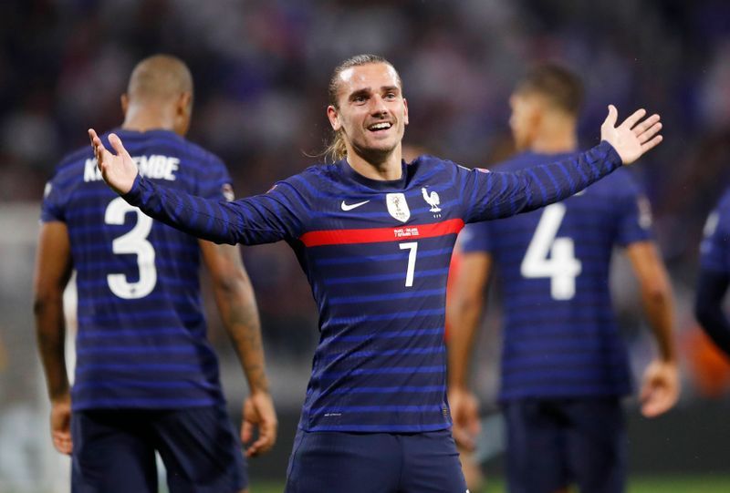 Soccer-Griezmann double fires France to victory over Finland