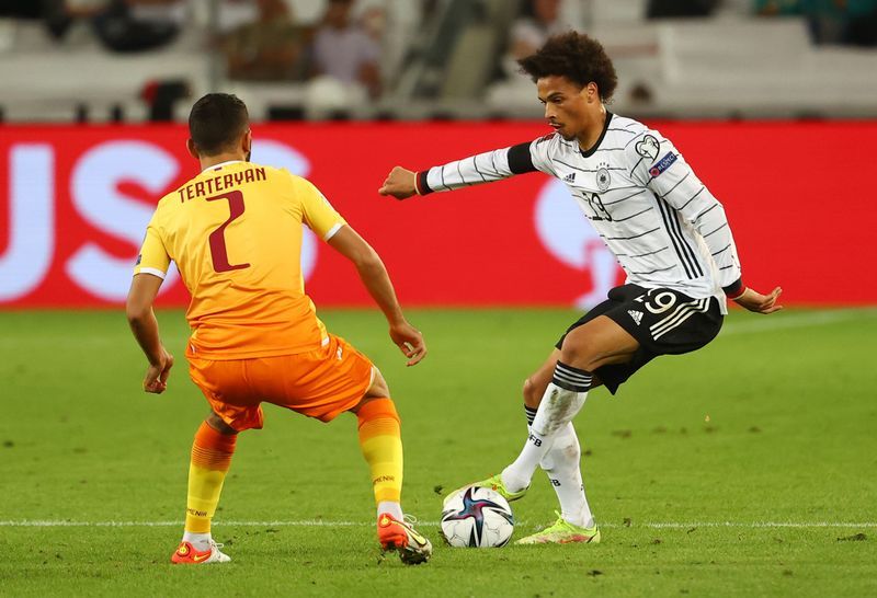 Soccer-Sane inspires Germany to big win over Iceland