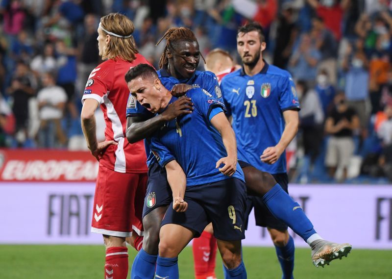 Soccer-Italy return to winning ways with rout of Lithuania