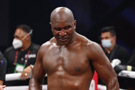 Holyfield, 58, humbled by 1st-round TKO