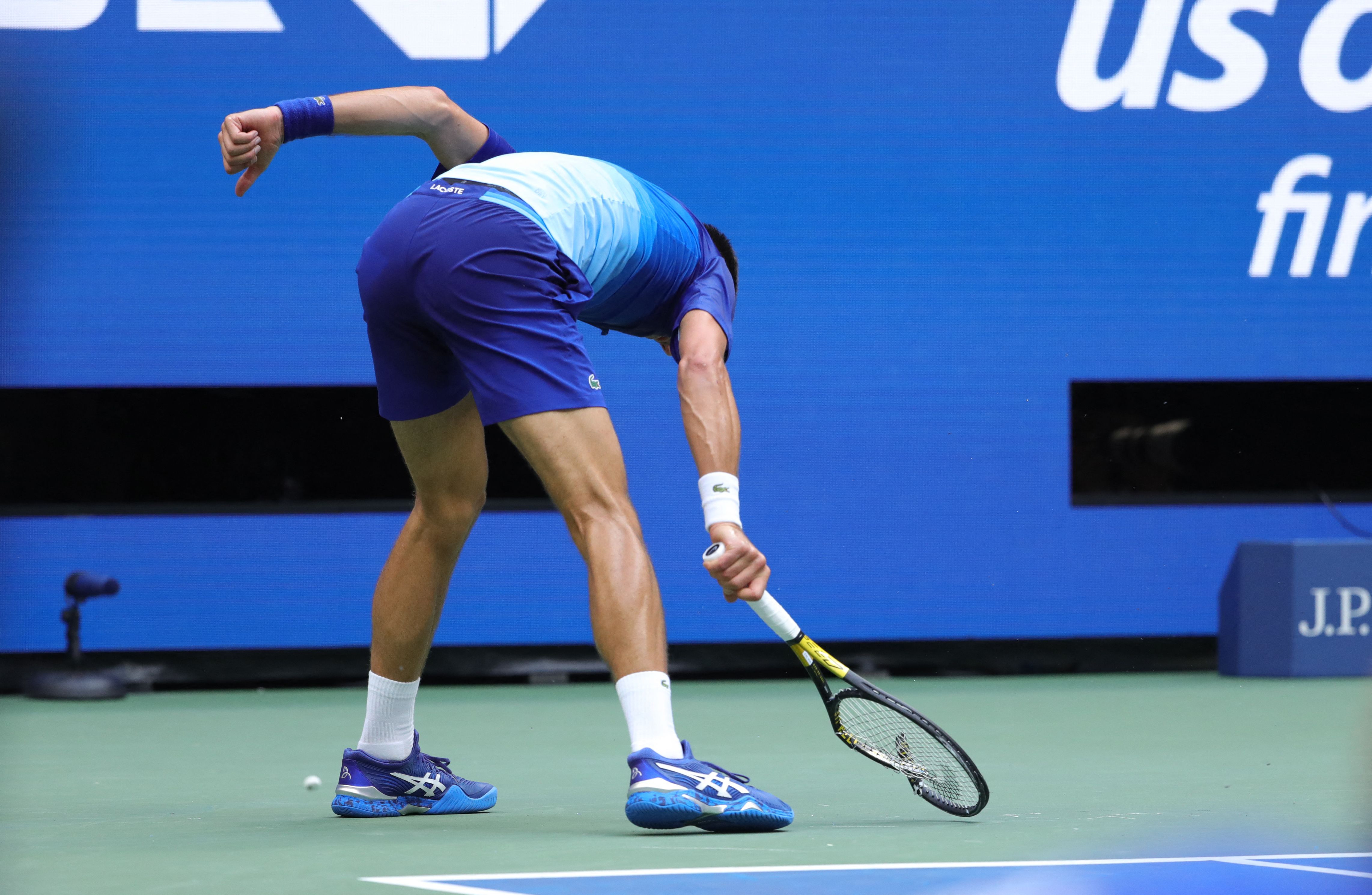 Novak Djokovic booed by US Open crowd and given warning after smashing racket