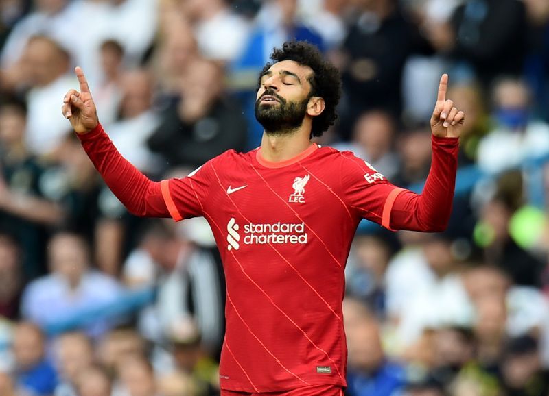 Soccer-Salah joins 100 club as Liverpool win at Leeds in match marred by Elliott injury