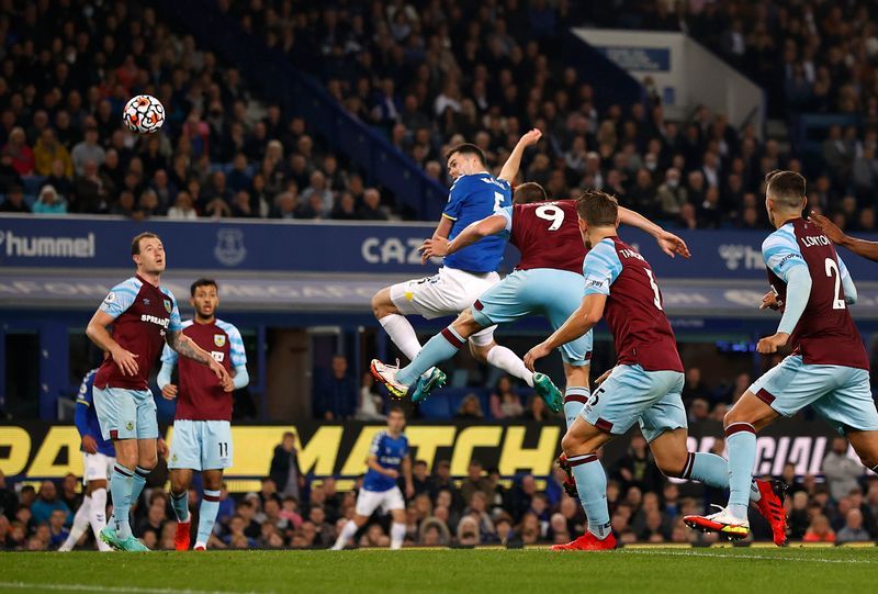 Soccer-Everton hit back in style to beat Burnley