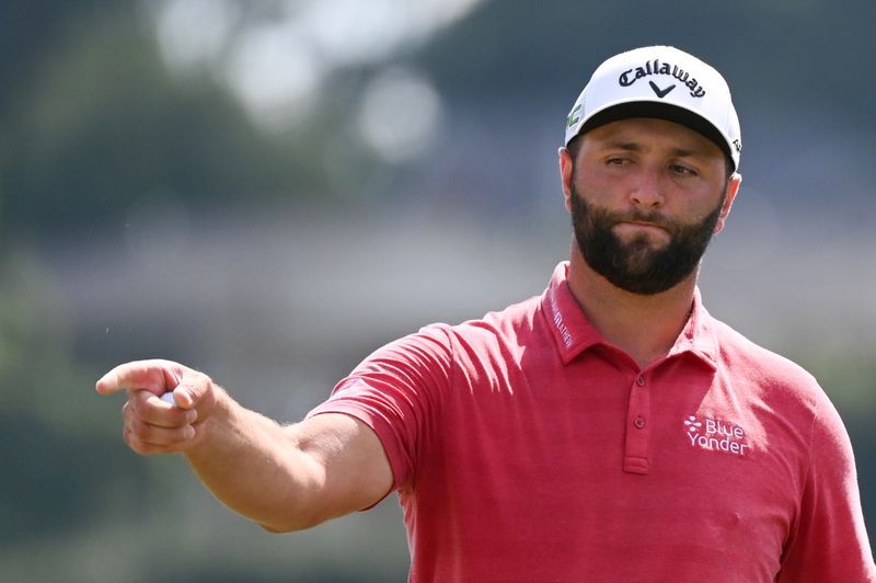 Golf - Stomach bug-stricken Rahm soldiers on with eye on Ryder Cup