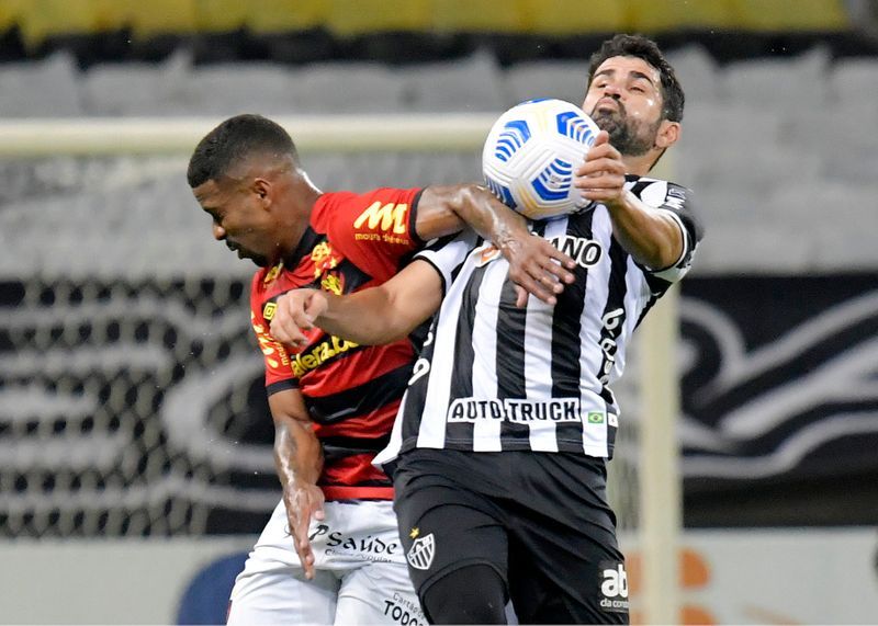Soccer-Atletico Mineiro win again to stay top in Brazil