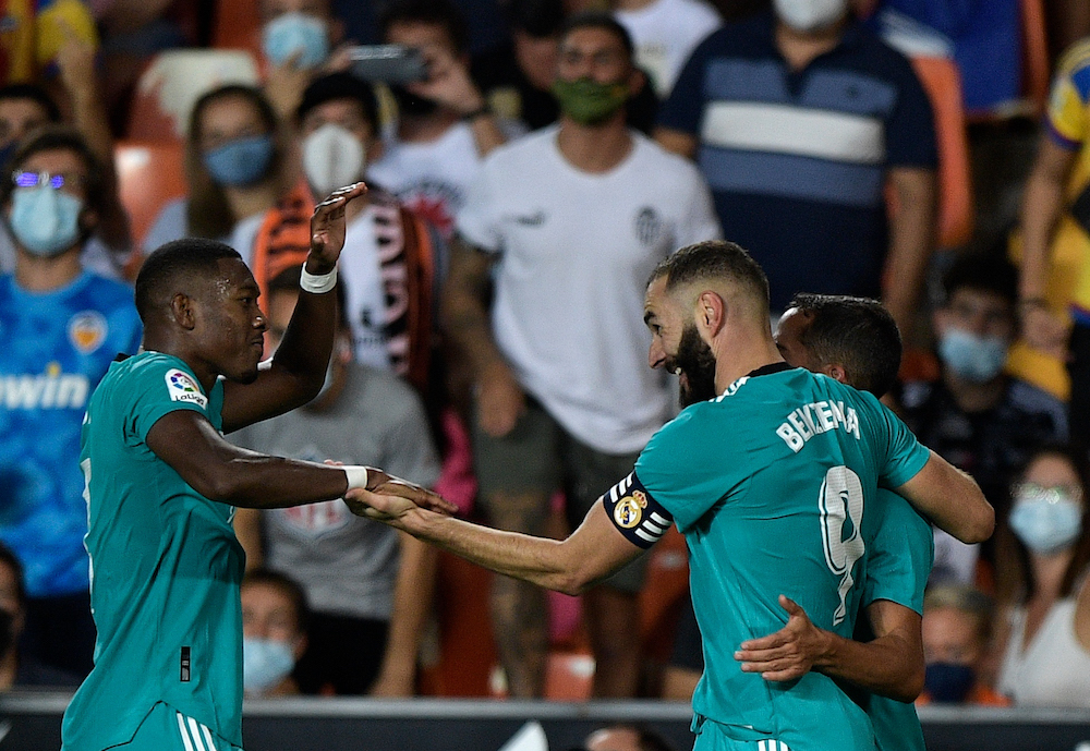 Real Madrid stage late comeback to win at Valencia