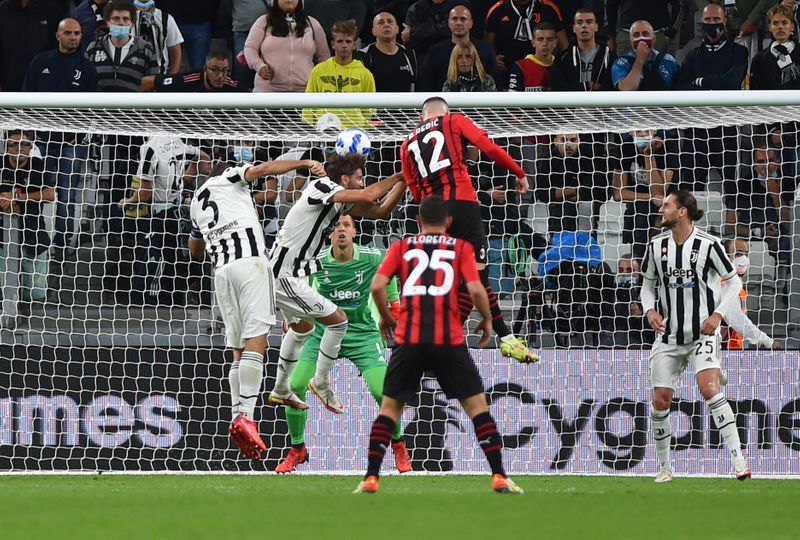 Soccer-Rebic earns Milan late draw at winless Juve