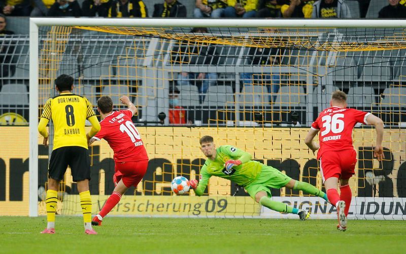 Soccer-Haaland strikes twice in Dortmund's 4-2 win over Union Berlin