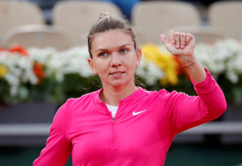 Tennis-Former world number one Halep splits with coach Cahill