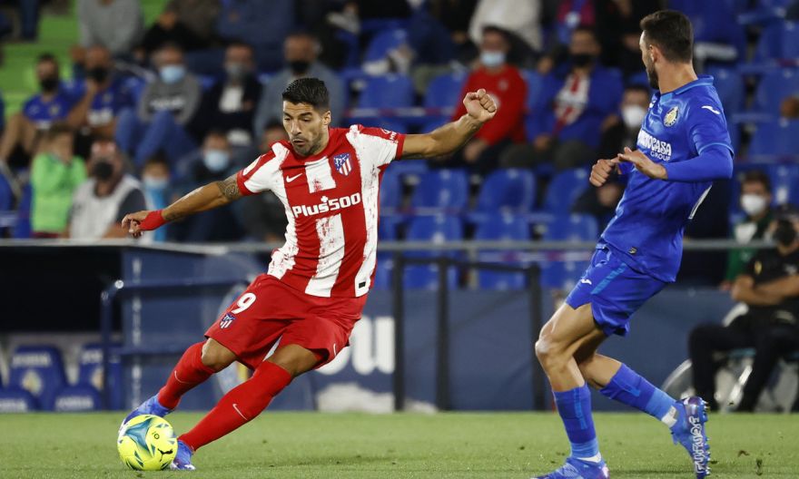 Football: Luis Suarez fires Atletico top with late double at Getafe