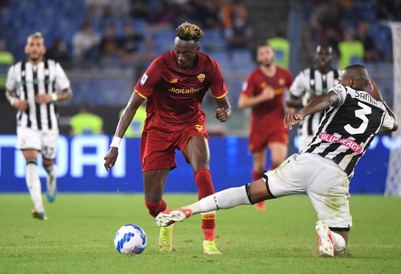 Soccer-Abraham strikes to earn Roma narrow win over Udinese
