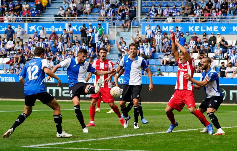 Soccer-Champions Atletico suffer shock loss at Alaves