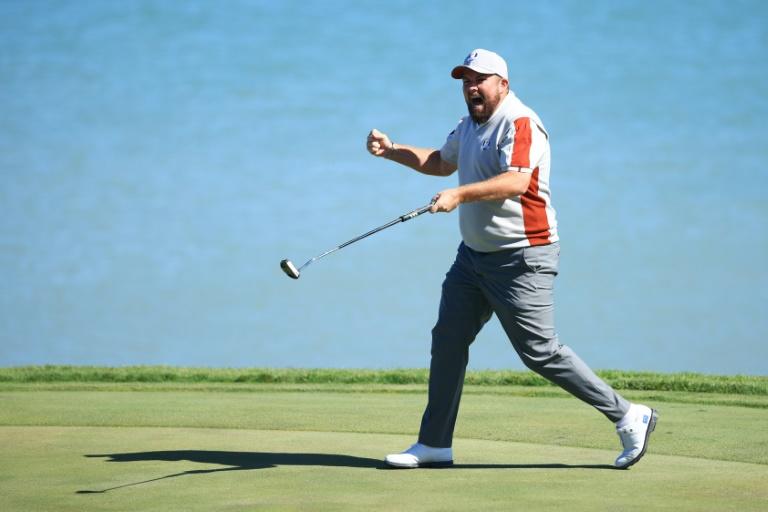 Lowry delivers for hurting Europe in Ryder Cup debut