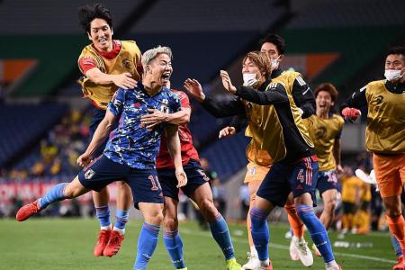 Japan beat Australia with late own goal