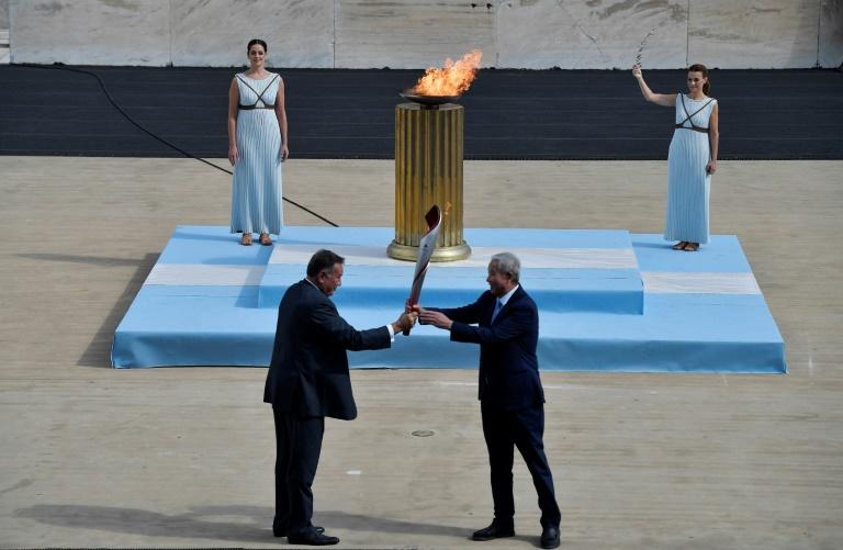Greece hands over Olympic flame to Beijing 2022 hosts