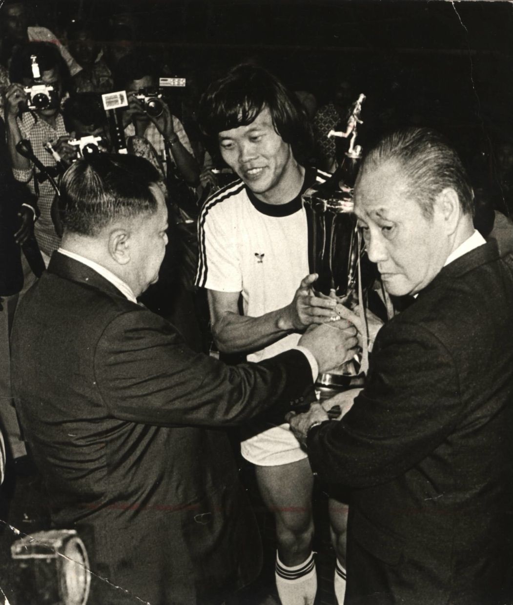 Is Towkay the only footballer in the world to have a double-century of international games?