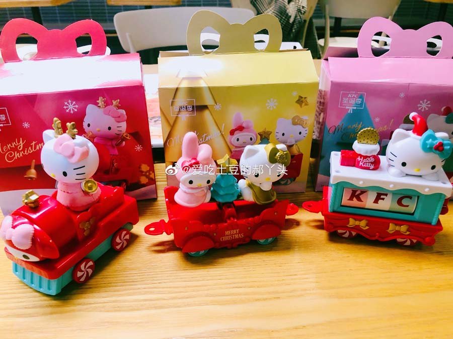 Kfc China has hello kitty chicken bucket & trains for festive sanrio fans