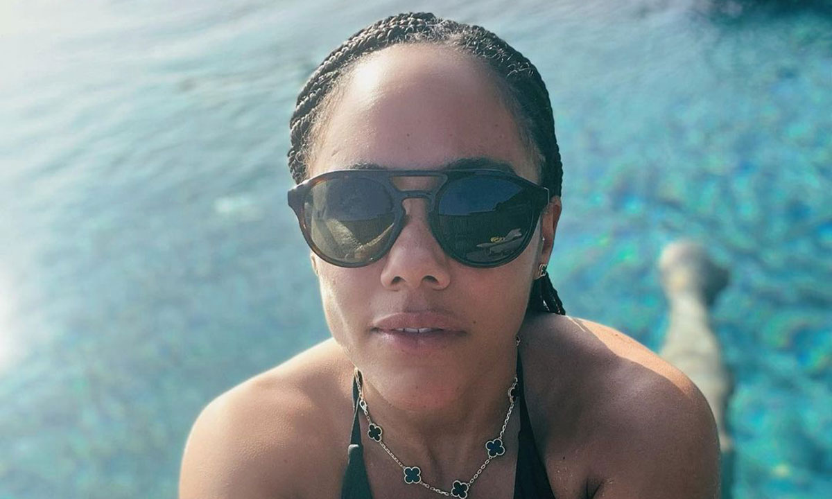 Alex Scott turns up the heat as she poses in a series of bikinis during beach holiday