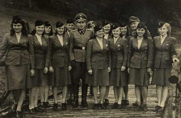 The Nazi party girls of Auschwitz: SS women romanced and caroused with death camp guard lovers as they oversaw the murder of thousands of Jews - before paying the ultimate price on the gallows