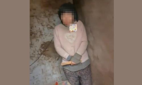 Video of woman chained to wall in shack causes outcry in China