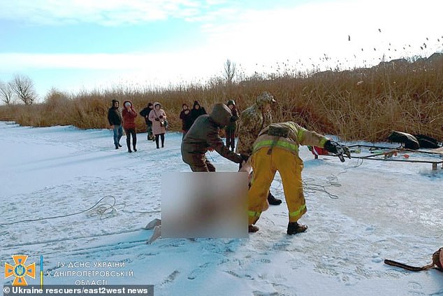 Husband drowns in front his wife after asking her to film him jumping into an ice pool in Ukraine