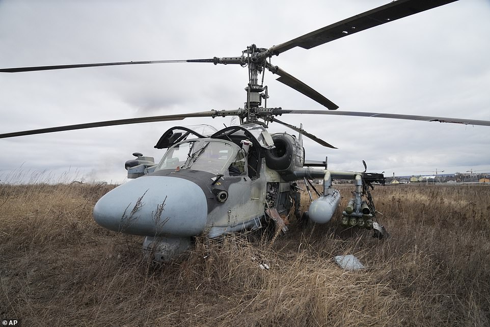 Ukraine strikes back: Kyiv's troops have already shot down five Russian helicopters, destroyed dozens of tanks - and entire battalion 'surrenders because they didn't realise they had been sent to kill'