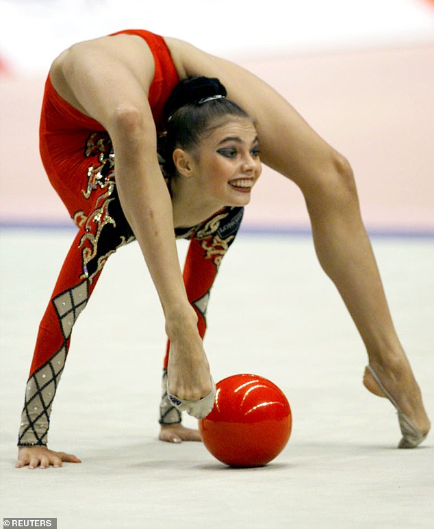 Vladimir Putin's Olympic gold-winning gymnast 'lover' 'is hiding out in 'very private and very secure' chalet in Switzerland with their four young children'