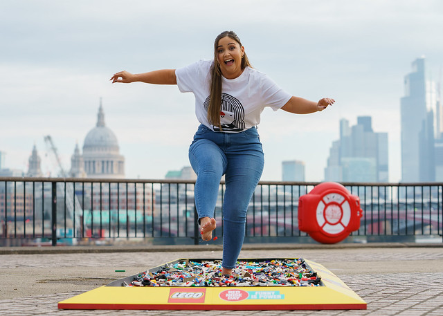 Jacqueline Jossa walks barefoot over Lego bricks for Comic Relief Red Nose Day