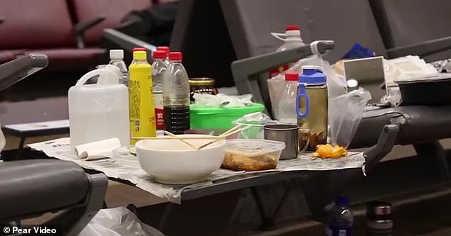 Chinese man has lived in an airport for 14 YEARS so he can get away from his family plus smoke and drink as much as he wants