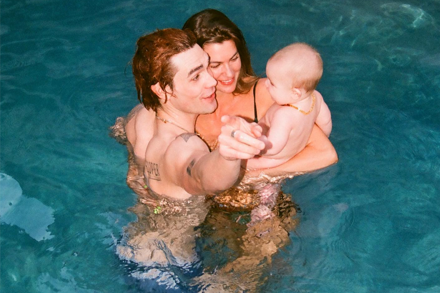 Clara Berry Goes for a Dip with KJ Apa and Son Sasha in Family Photos: 'The Men of My Life'