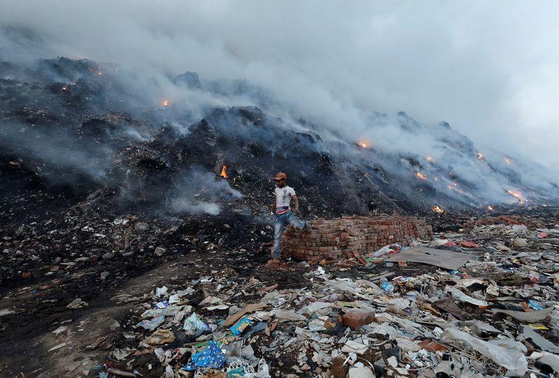 India too hot, says modi, sending fire warning nationwide as delhi landfill burns