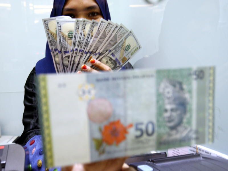 Ringgit rallies against US dollar after Fed signals a more dovish stance going forward